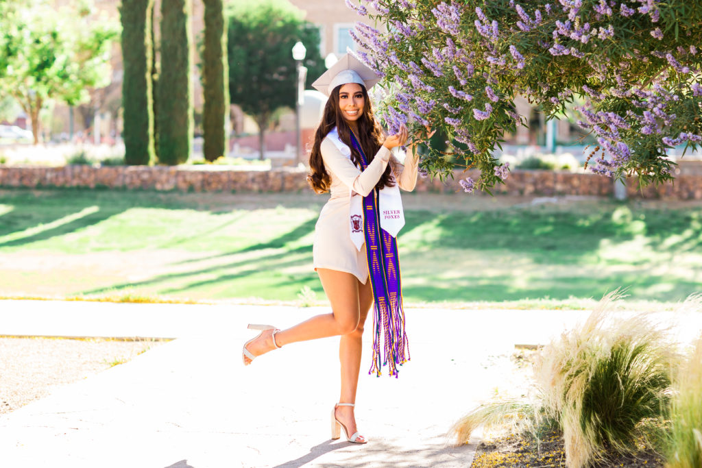 girl in graduation cap smiling